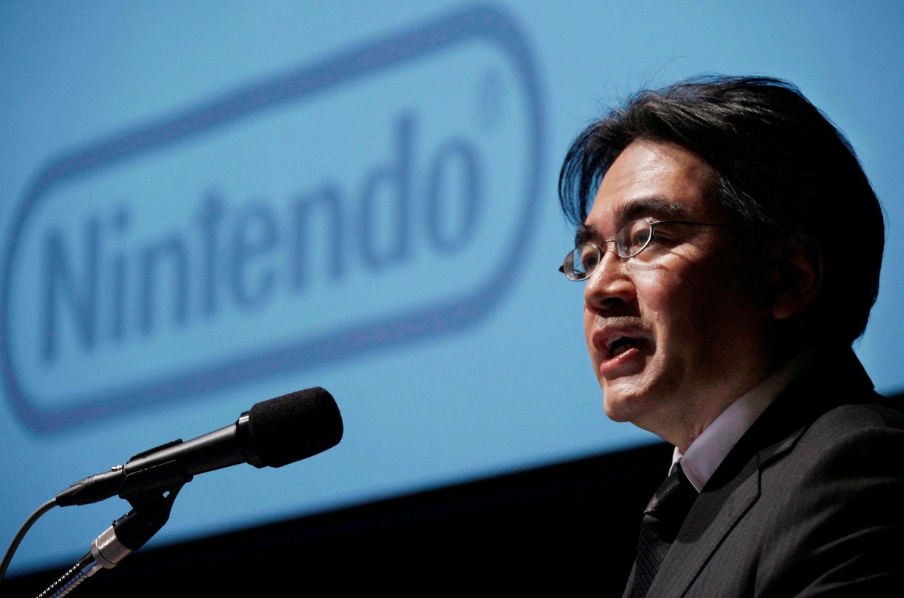 Nintendo Co. President Satoru Iwata speaks during a press conference in Tokyo Friday, Jan. 27, 2012. Nintendo, a Japanese video game machine maker, sank to losses for the April-December period, battered by a price cut for its 3DS handheld, a strong yen that erodes overseas earnings and competition from mobile devices such as the iPhone that offer games-on-the-go. (AP Photo/Koji Sasahara)